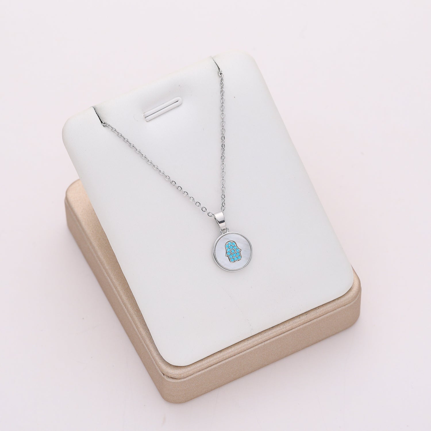 16" cad delgada dije / circulo madre perla manita dentro / plata