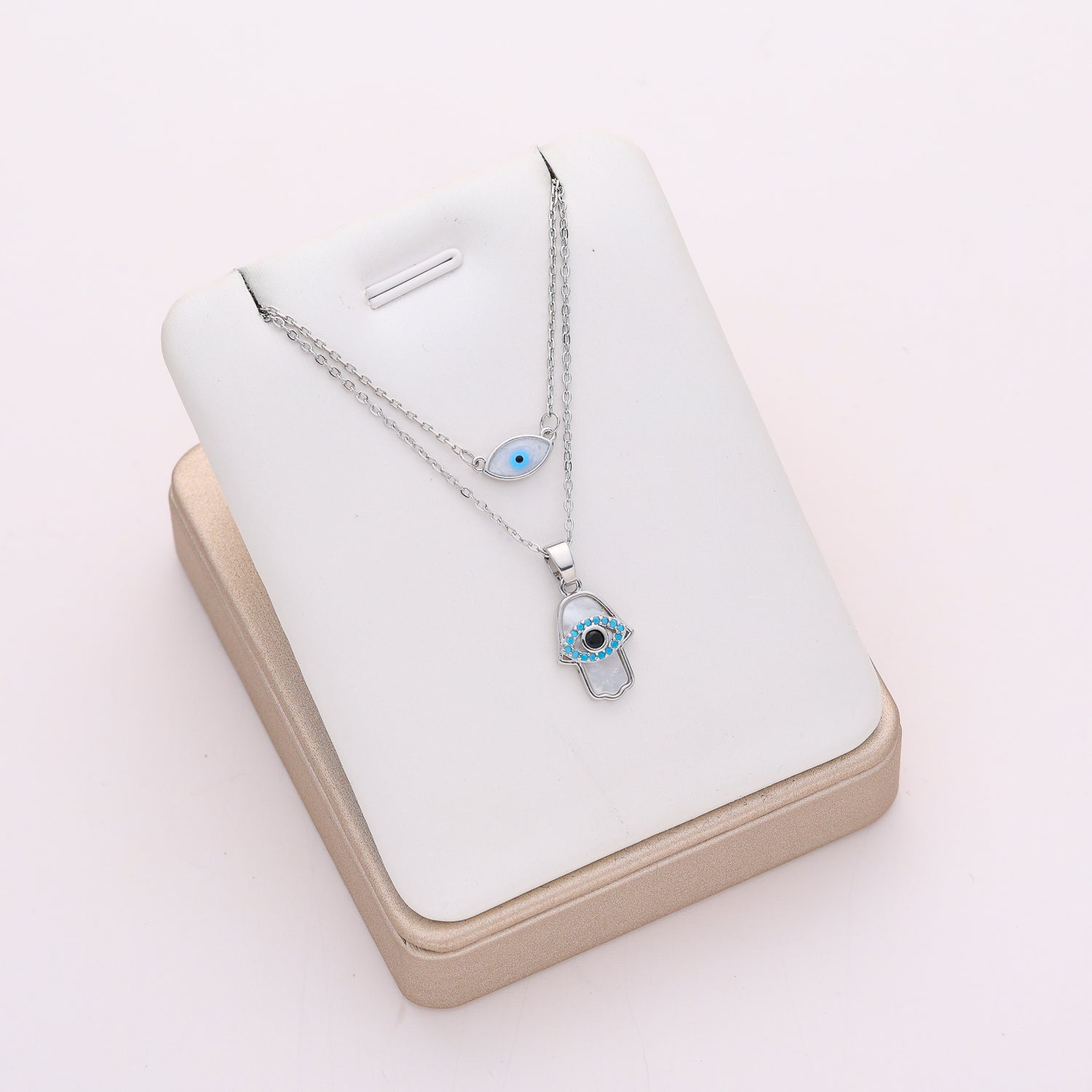 16"  2 cadenas delgadas dijes manita y ojito platacad delgada dije