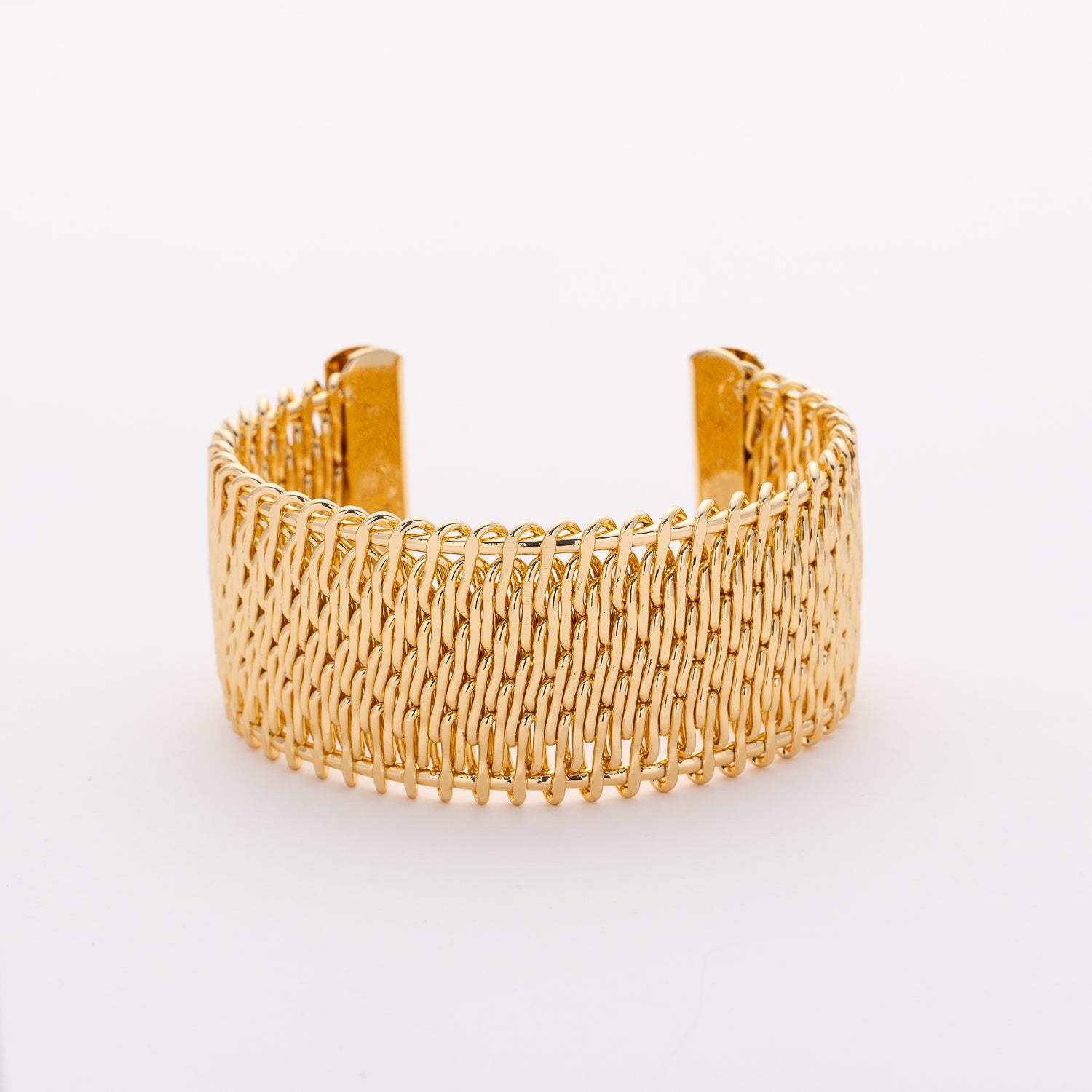 brazalete ancho dorado texturizado trenzado