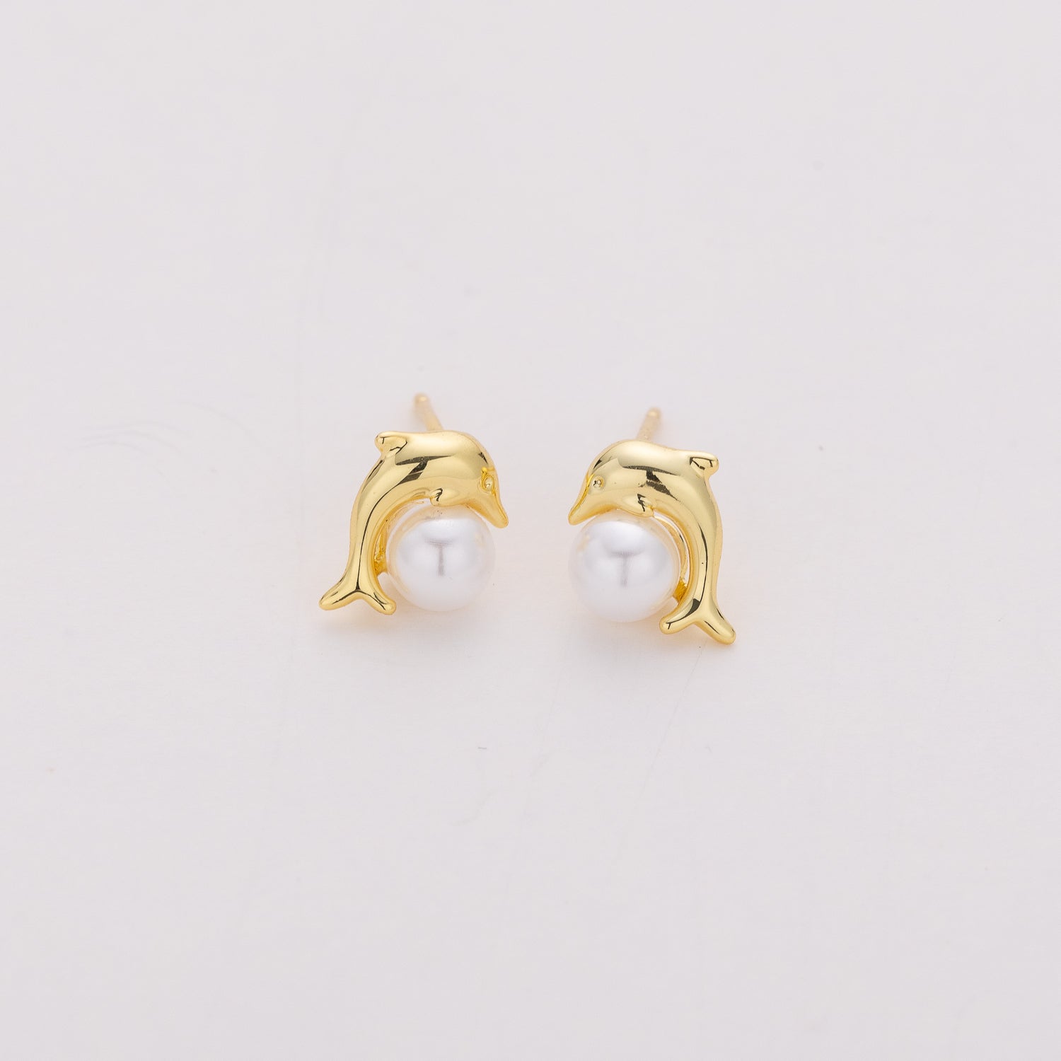 broquel mini delfin con perla / dorado
