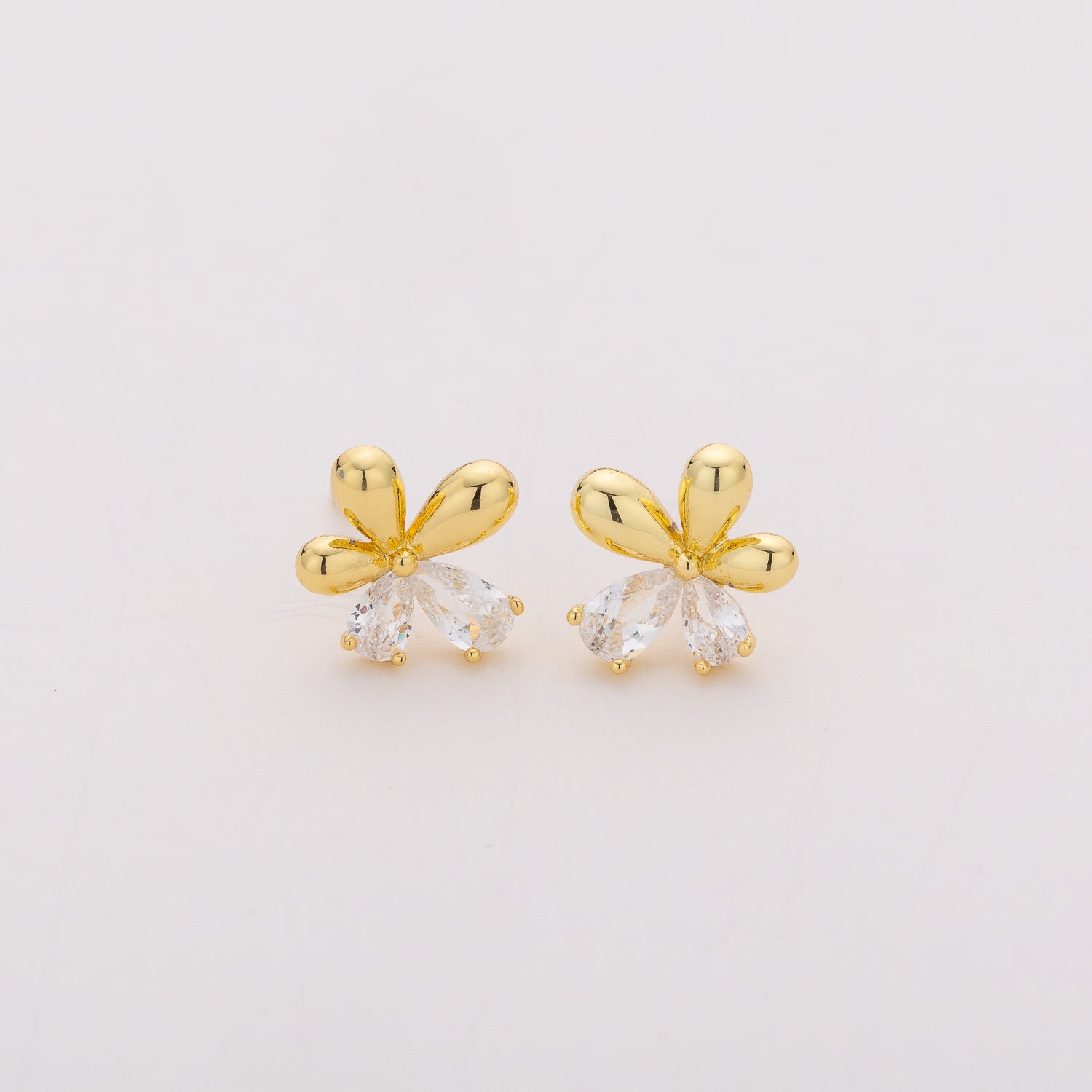 broquel flor / 2 gotas cristal / dorado