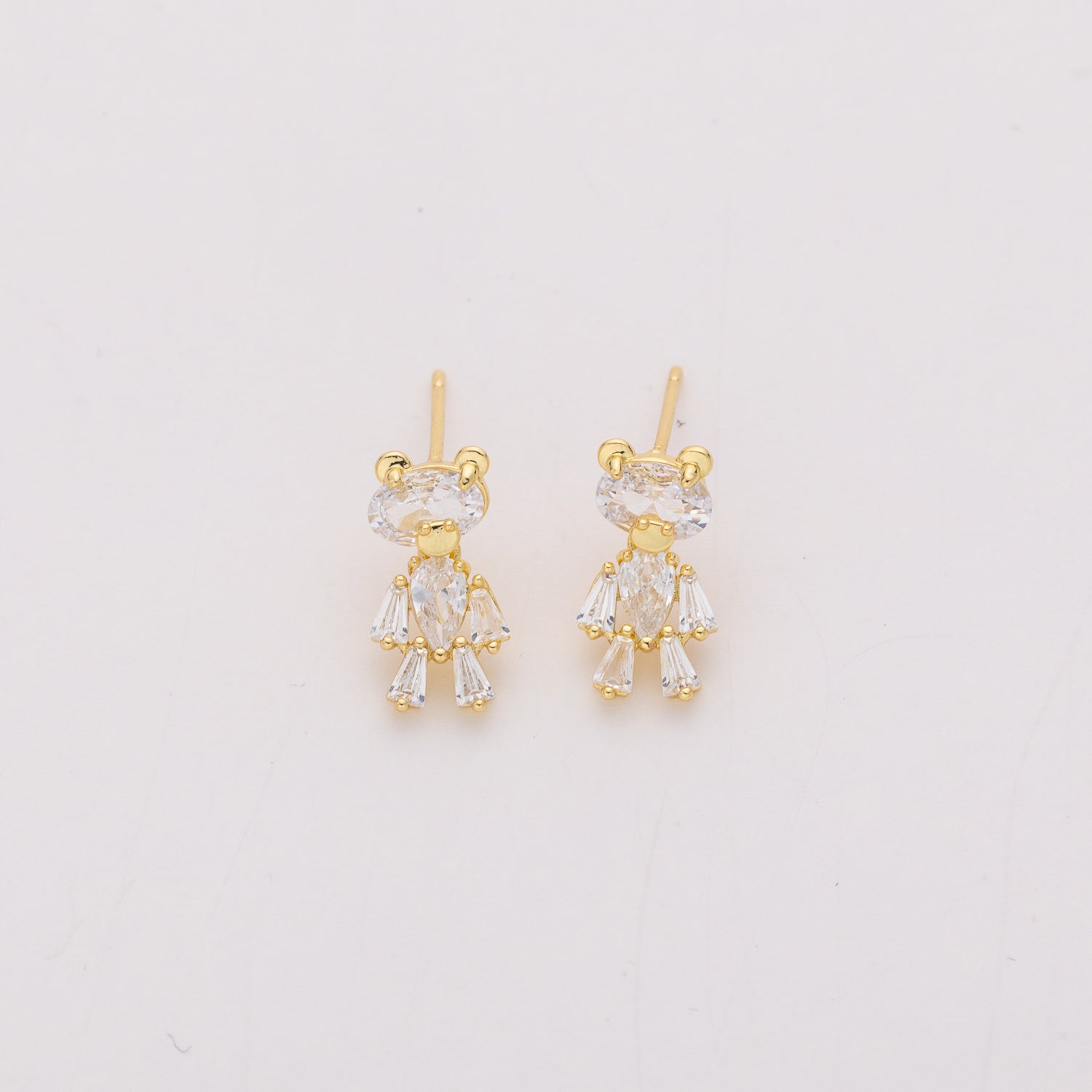 osito / articulado / cristal ovalado / dorado