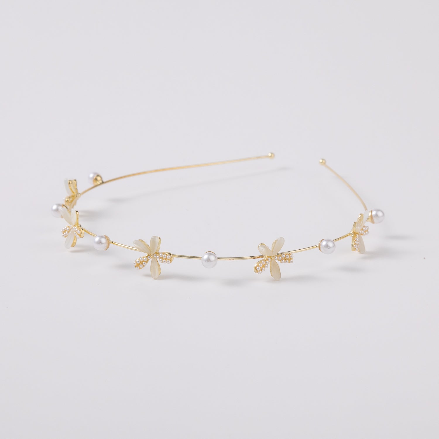 DIADEMA METALICA DELGADA / FLORES OJO DE GATO Y CRISTAL / DORADO