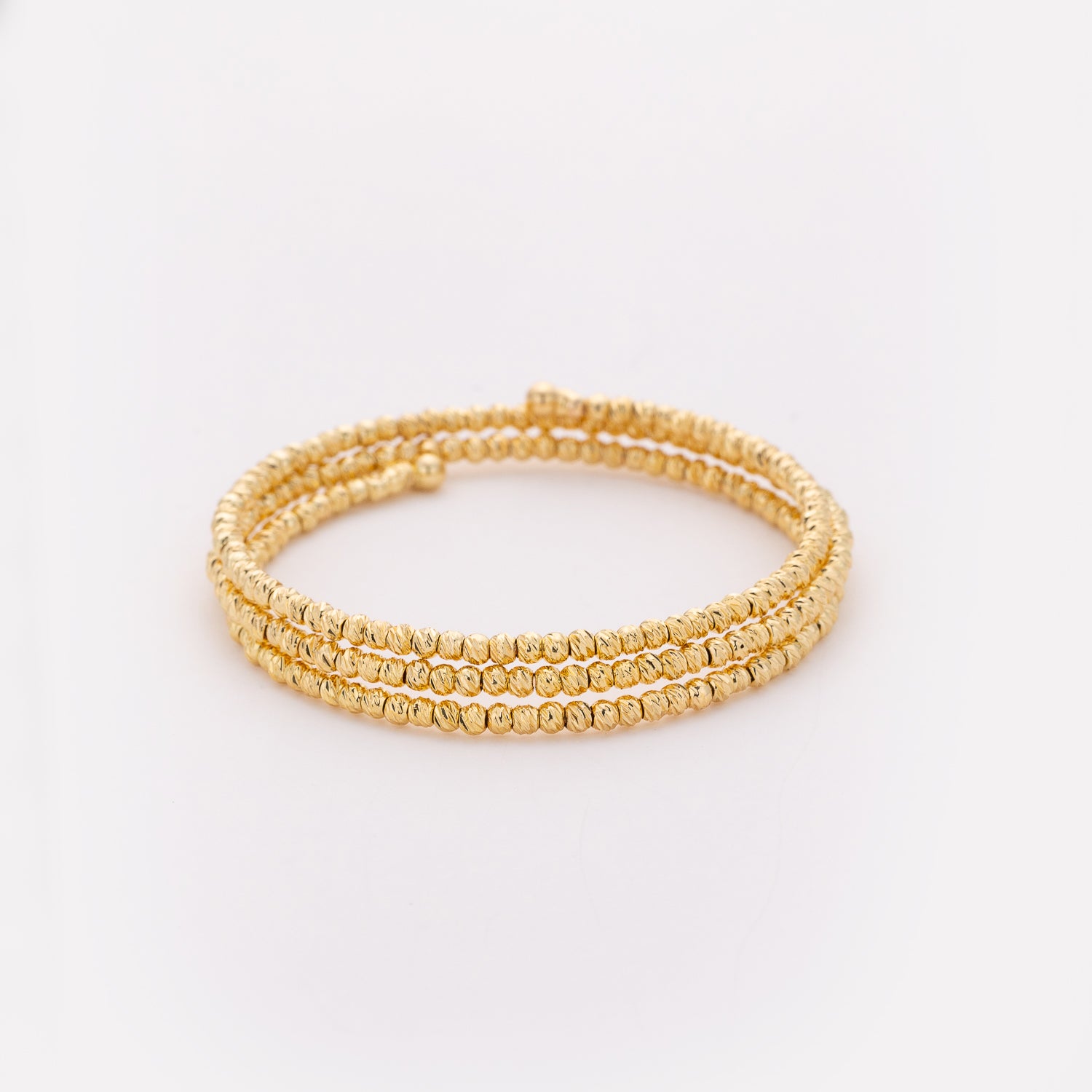 BRAZALETE / 3 LINEAS ELASTICAS / BOLITAS TEX / DORADAS