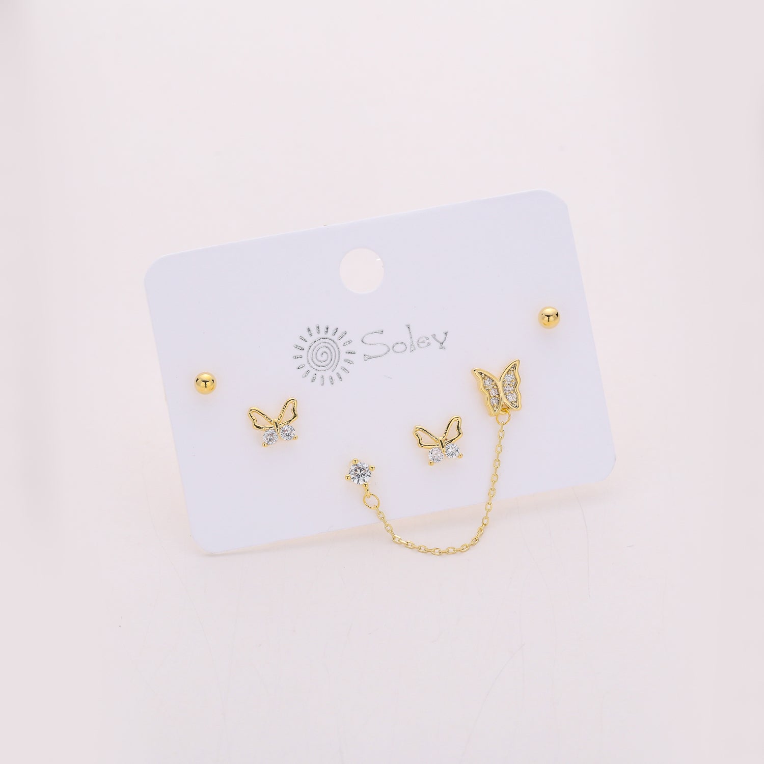 3 pares / broquel /3 mariposas / bolas / dorado