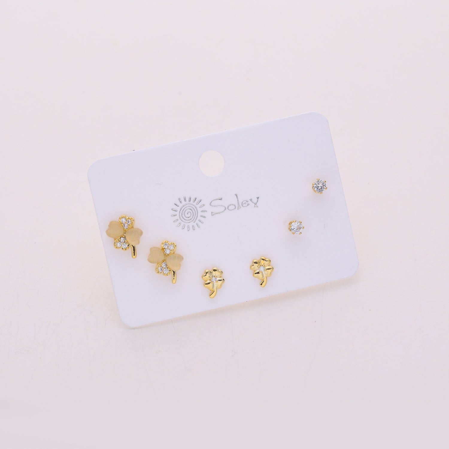 3 pares / broquel /2 treboles ojo de gato y cristal / cristal / dorado