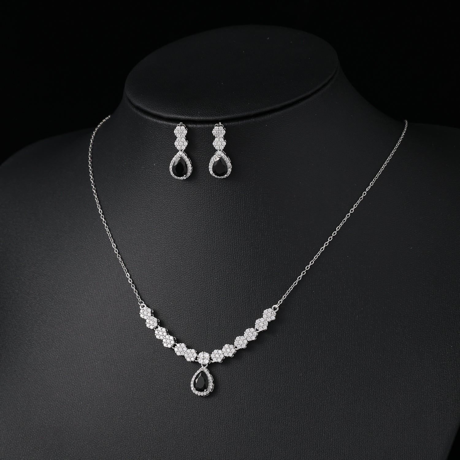 coll y are /cad del/ 10 flores cristal / cuelga gota med / cristal negro / plata