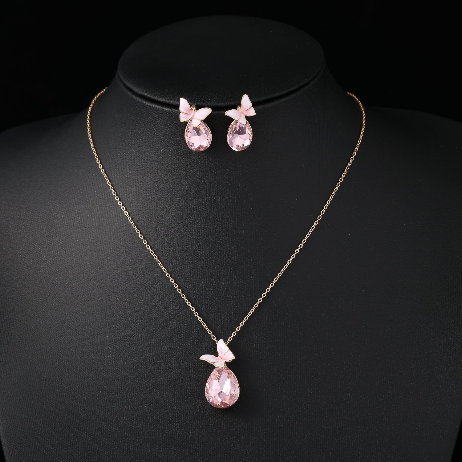 coll y are /cad del / dije gota cristal rosa g / mariposa esmalte/ aretes juego/ dorado