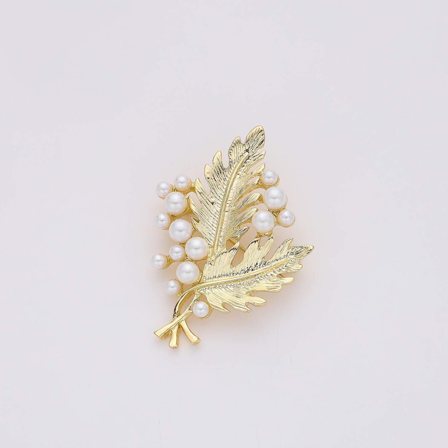 PRENDEDOR 2 HOJAS  DORADO Y PERLAS