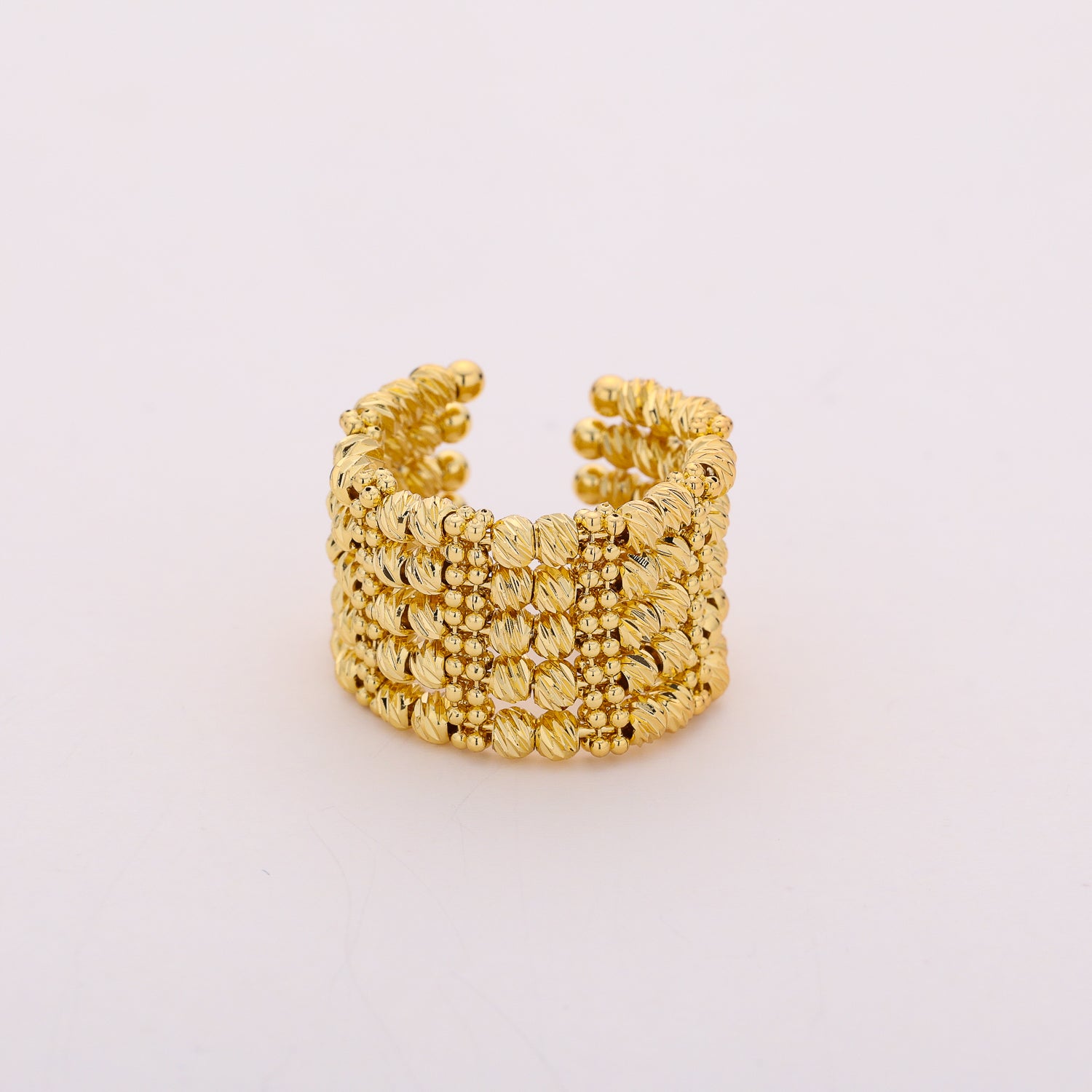 anillo ancho 5 lineas bolitas texturizadas / dorado