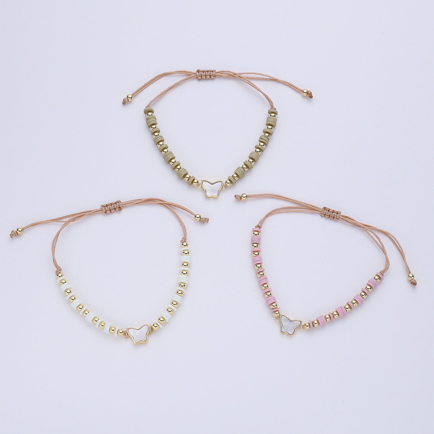 PULSERA CORDON / CILINDROS BLANCO / MARIPOSA MADRE PERLA / DORADO