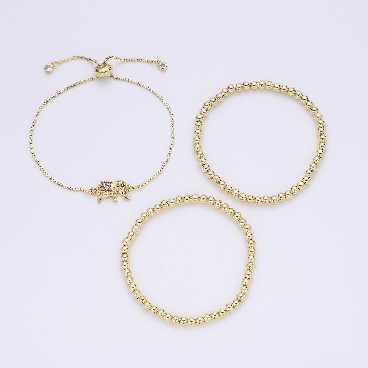 2 LINEAS BOLITAS  /1 BOX / ELEFANTE / BROCHE BOLA CORREDIZA/ DORADO