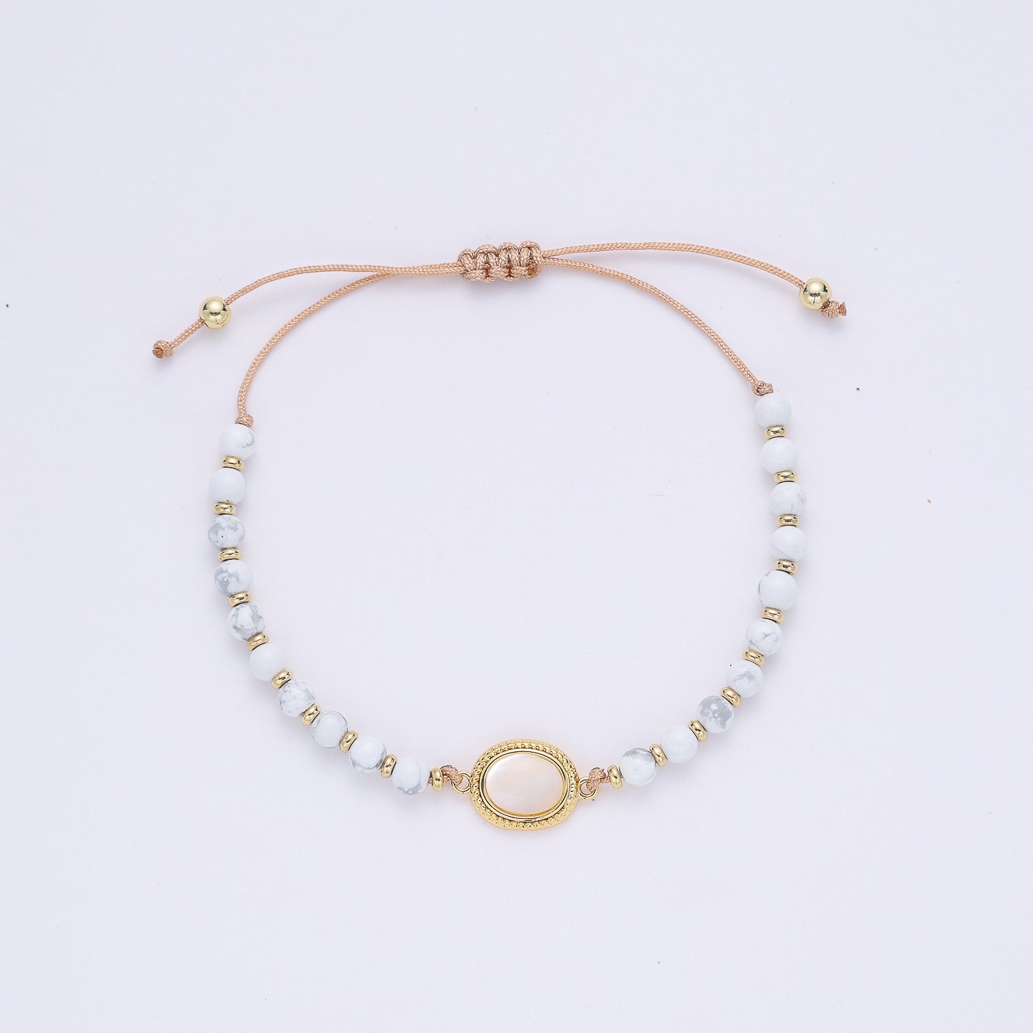 PULSERA HILO/ BOLAS NATURALES BLANCAS / OVALO OJO DE GATO / DORADO