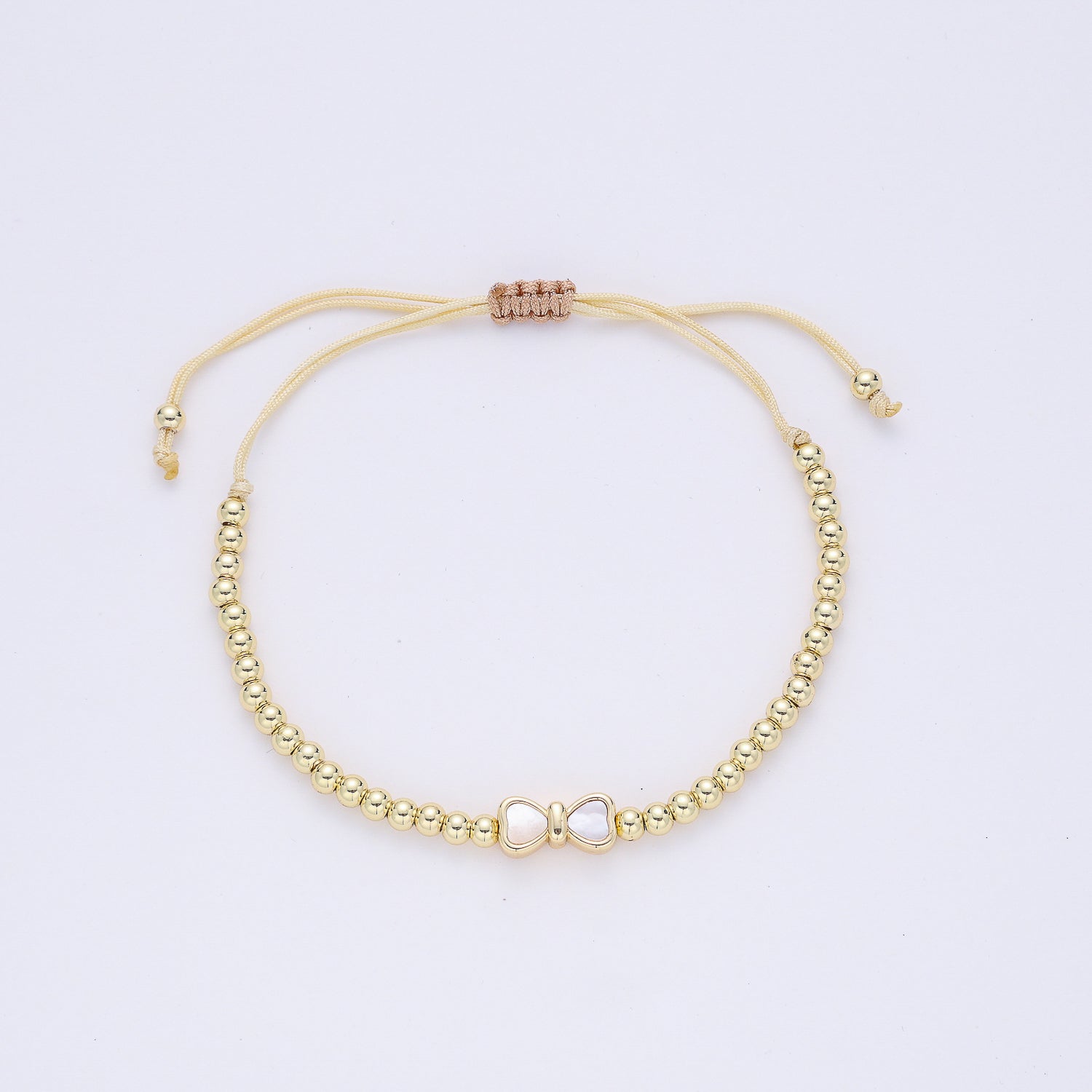 PULSERA CORDON NEGRO / BOLITAS MED DORADAS / DIJE MOÑO MADRE PERLA