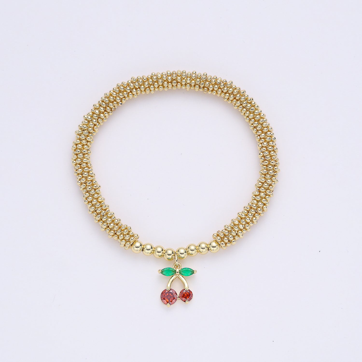 PULSERA ELASTICO / AROS DORADOS CON PUNTOS / DIJE CEREZAS