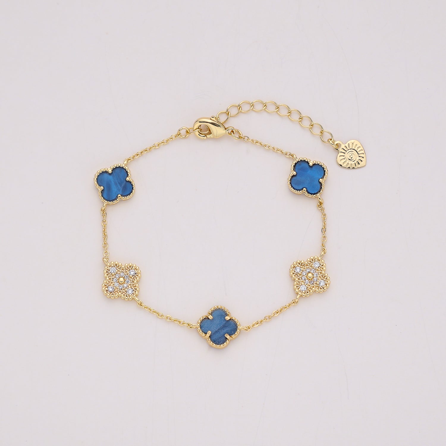 CAD DELGADA / 5 FLORES VAN / CRISTAL Y MADRE PERLA / DORADO