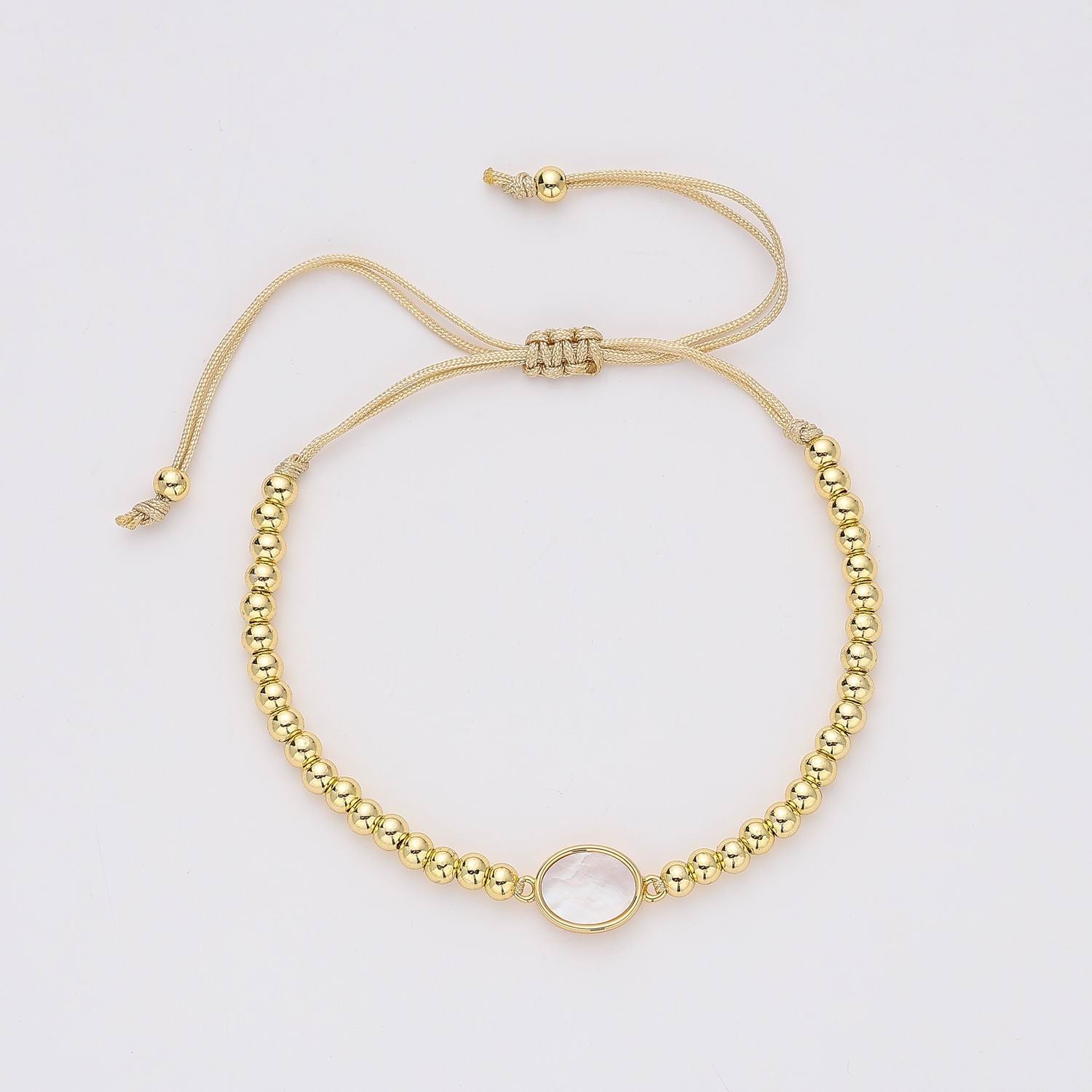 CORDON /BOLITAS METAL / DIJE OVALO MADRE PERLA / DORADO