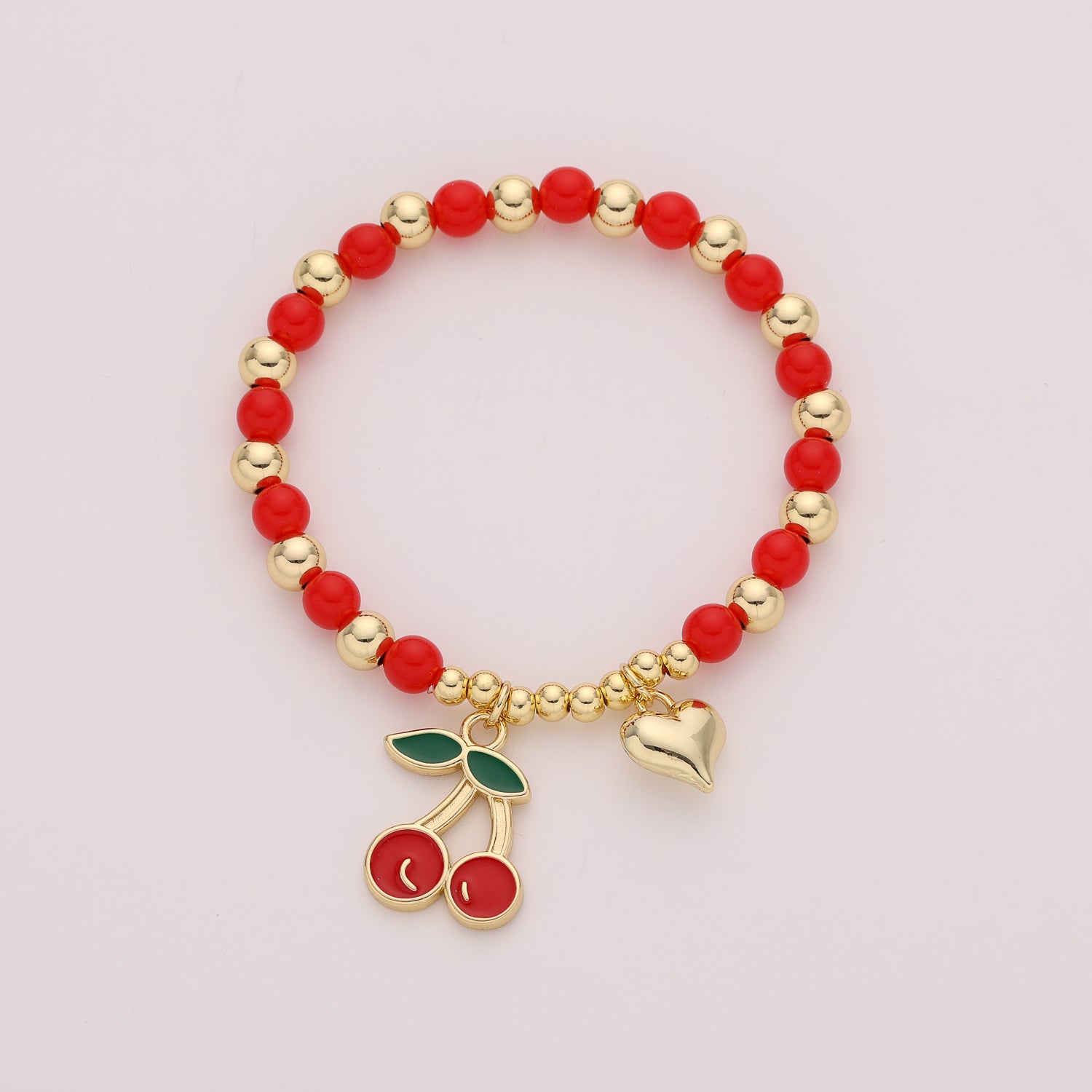 ELASTICO CHECOS ROJOS / BOLA DORADA / DIJE CEREZA / DORADO