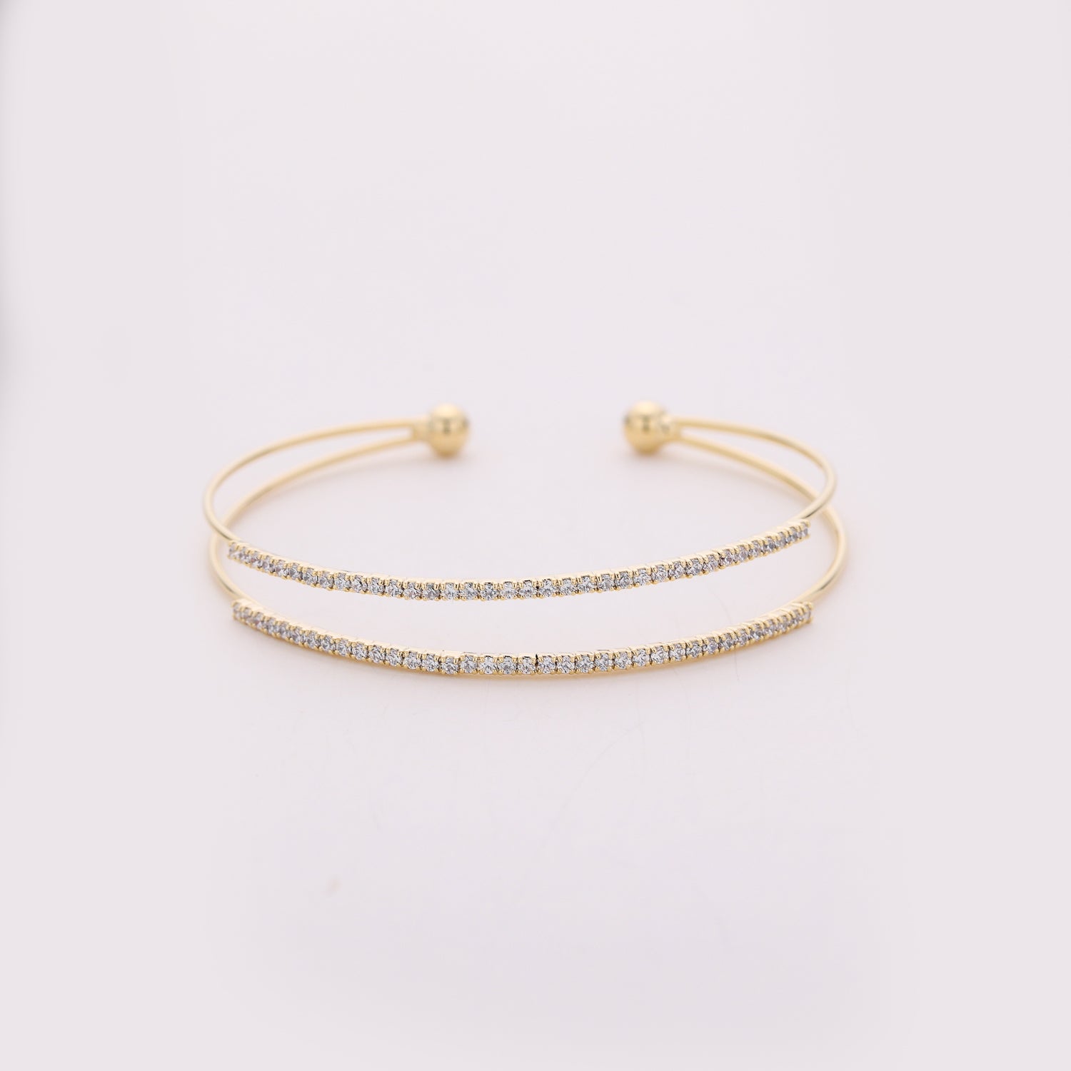 PULSERA RIGIDA / 2 LINEAS CRISTAL SEPARADAS / DORADO
