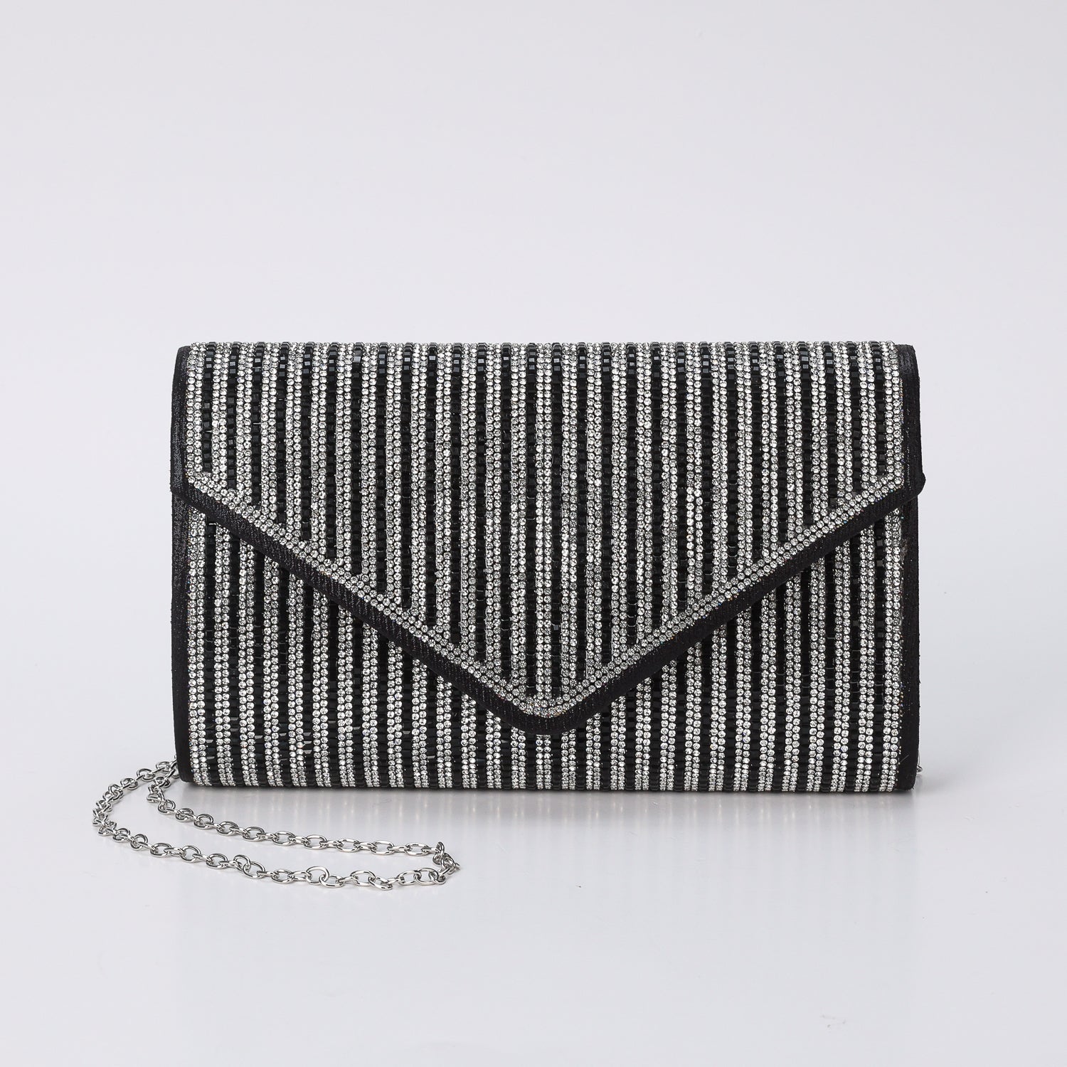 NOCHE / CLUCH RECTANGULAR / CRISTAL EN LINEAS / FLAP EN PICO / NEGRO