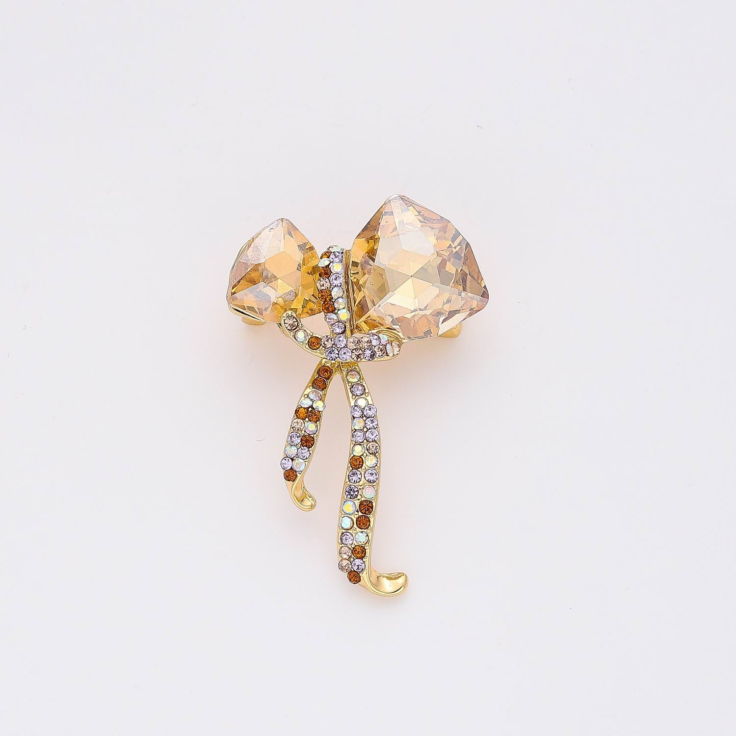 PRENDEDOR MOÑO LAZO CRISTAL / AMBAR / DORADO