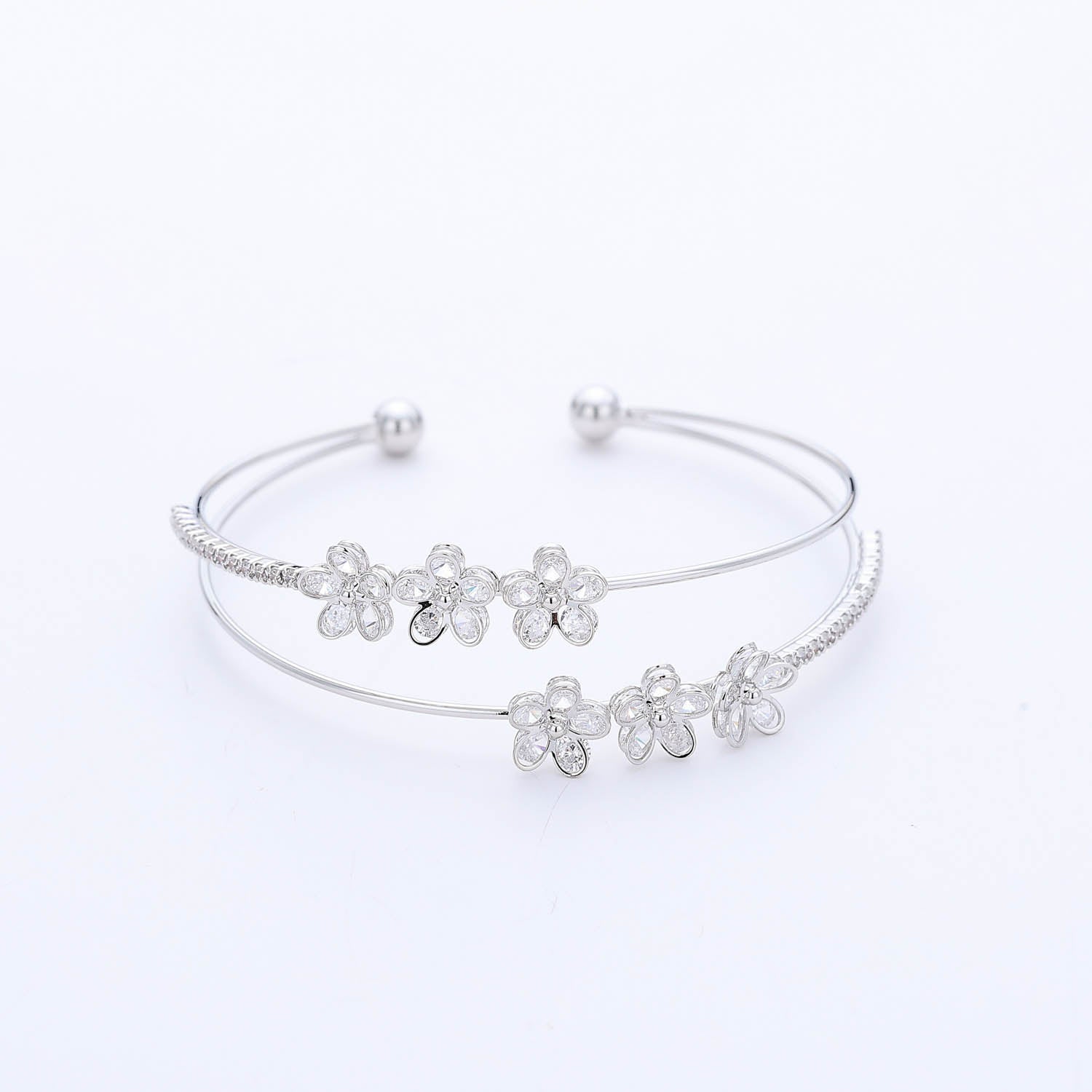BRASALETE DEL / 2 LINEAS /3 FLORES CRISTAL / PLATA