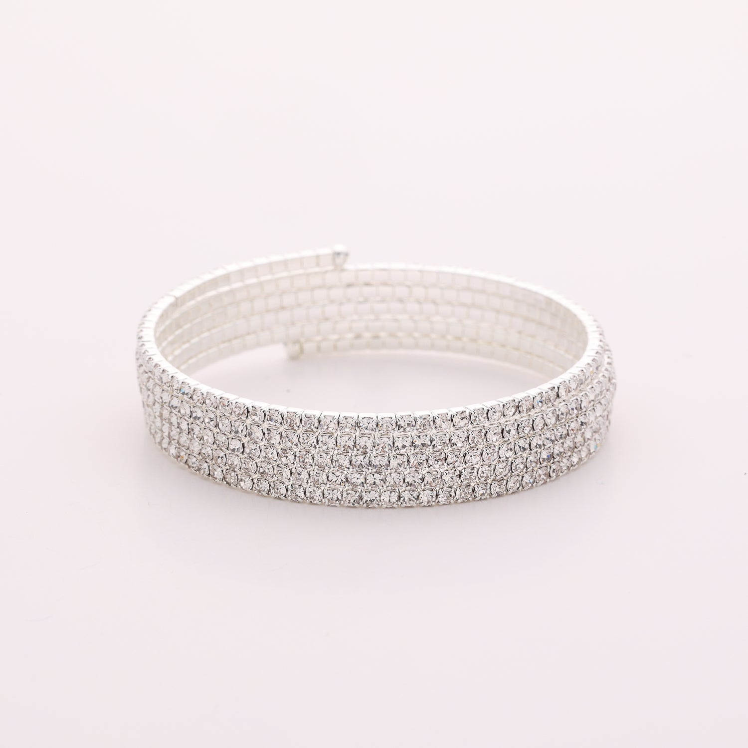 PULSERA EN RESORTE SEMI RIGIDA 5 LINEAS SEPARADAS DELGADAS CRISTAL PLATA