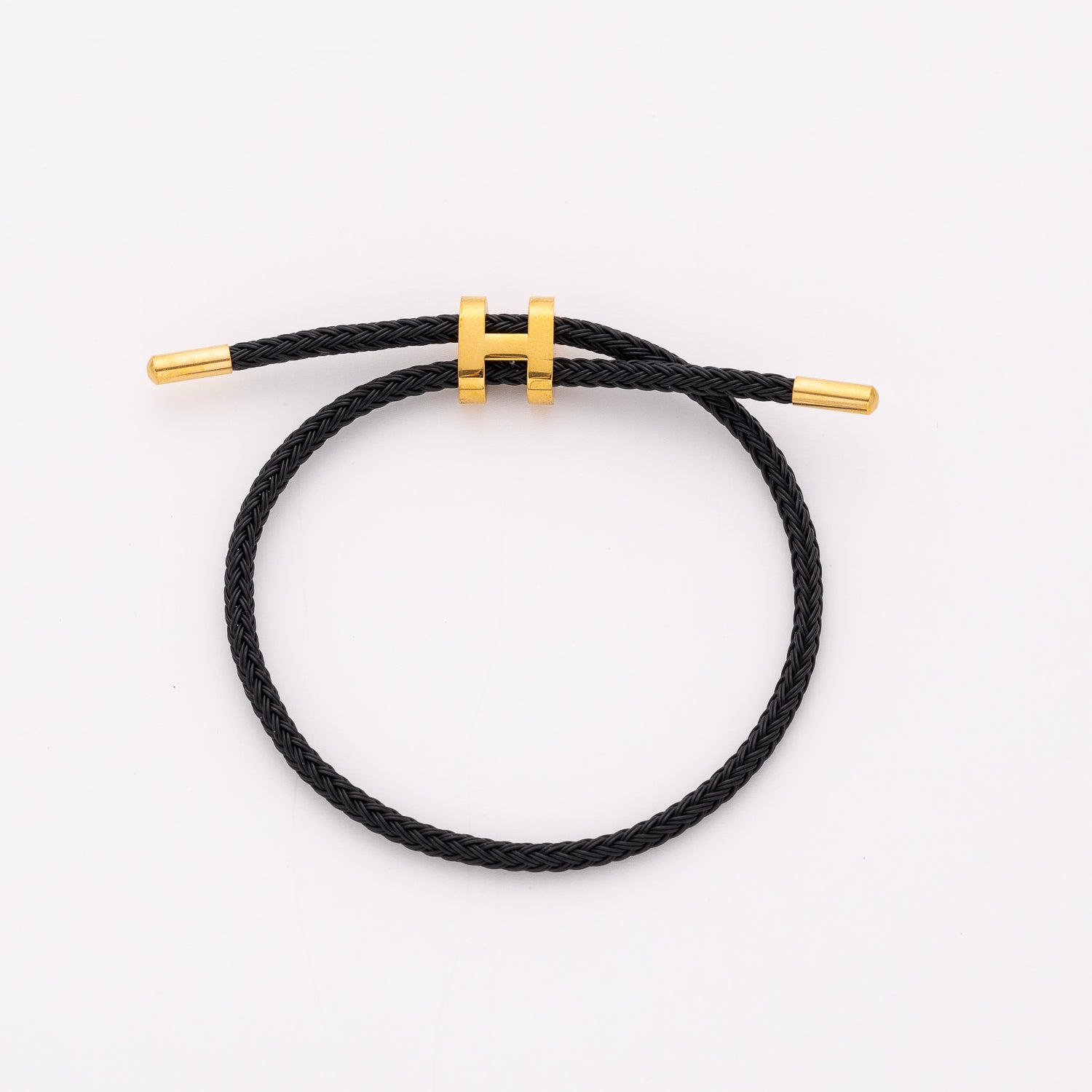 pulsera piu trenzado  rigido / cruzado en h /dorado
