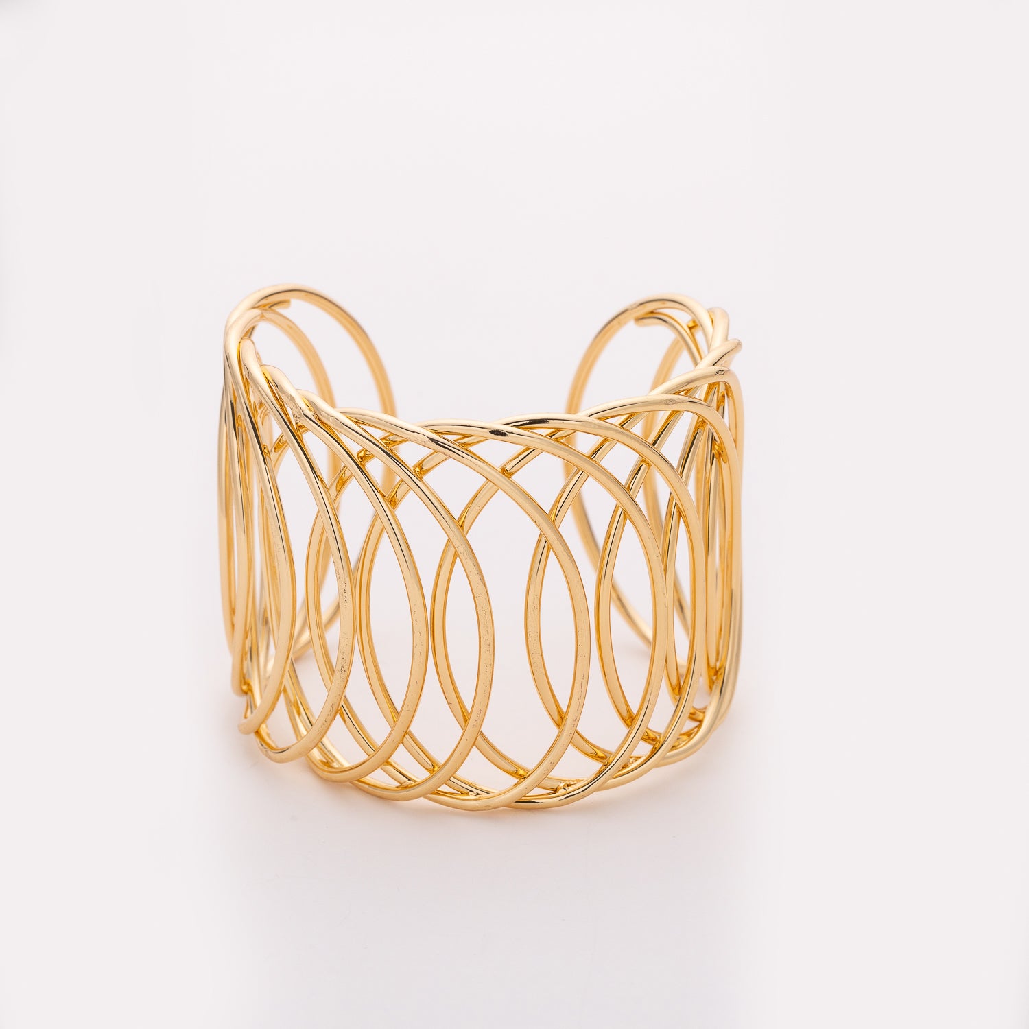 brazalete muy ancho ovalos ensamblados / dorado